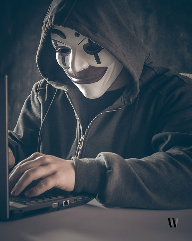Anonymous computer hacker in white mask and hoodie. Instagram - @bermixstudio
